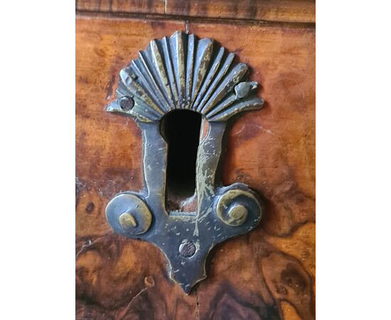 Bow-fronted chest of drawers.