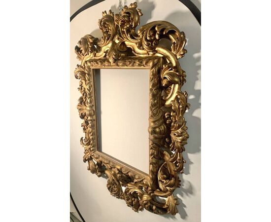 Large Baroque-style frame in carved and gilded wood. Bologna, late 19th century.