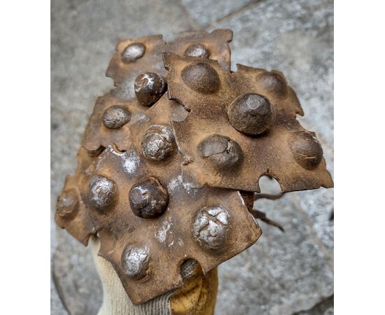 4 Large wrought and embossed iron nails, 17th-18th century