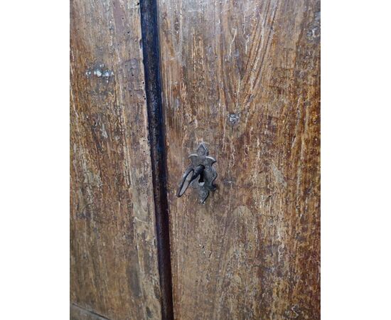 Small writing desk painted to look like wood.