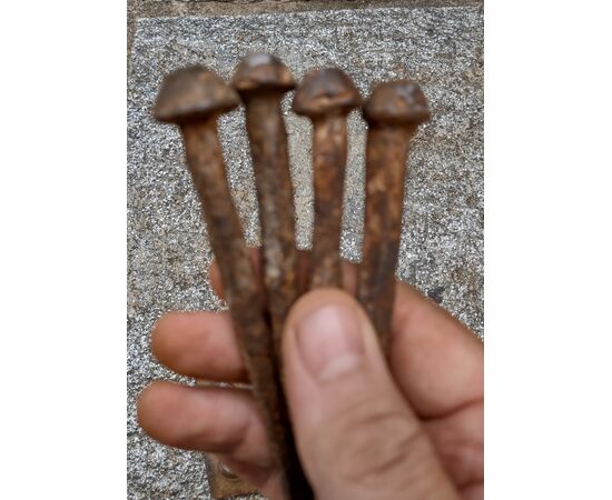 4 Large wrought and embossed iron nails, 17th-18th century