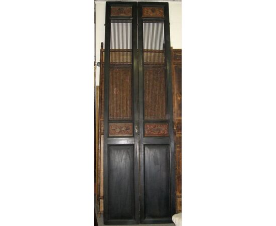 04 Lacquered and carved Chinese door panels.