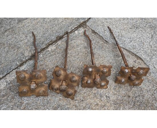 4 Large wrought and embossed iron nails, 17th-18th century