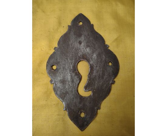 Baroque style wrought iron escutcheon