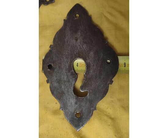 Baroque style wrought iron escutcheon