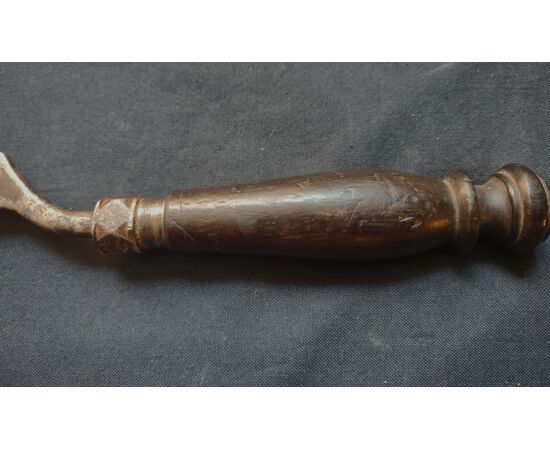 Refined wrought iron and engraved winegrower's tool.