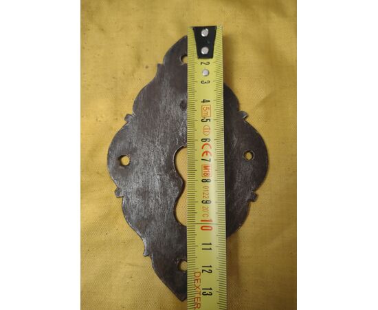 Baroque style wrought iron escutcheon