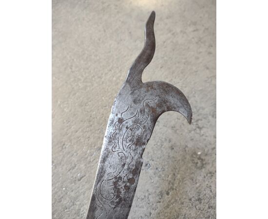 Refined wrought iron and engraved winegrower's tool.