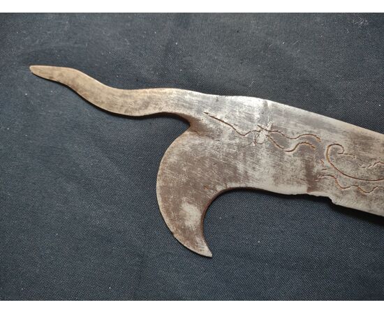 Refined wrought iron and engraved winegrower's tool.