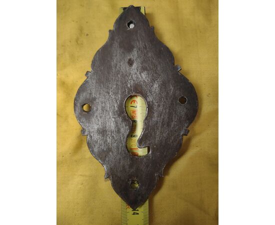 Baroque style wrought iron escutcheon