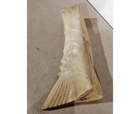 Antique African bone sculpture depicting a face - 19th century