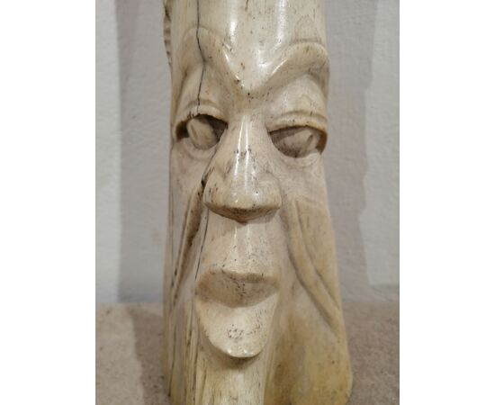 Antique African bone sculpture depicting a face - 19th century