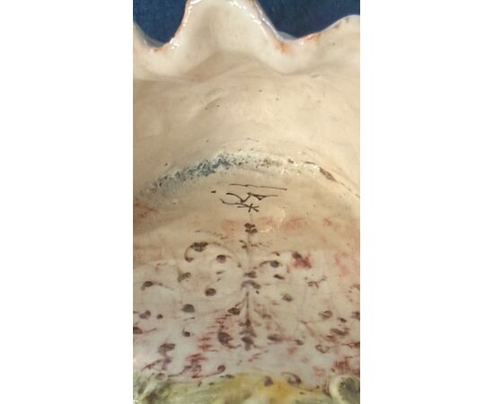 Polychrome majolica holy water font with a depiction of the Madonna. Minghetti. Bologna.