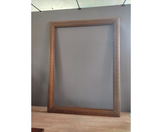 Grande cornice in legno