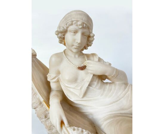 Scultura donna su amaca - inizio Novecento