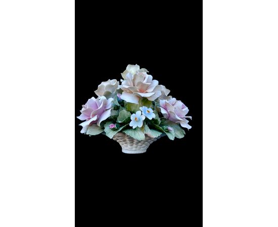 Floral arrangement with Bisquit porcelain basket. Capodimonte.