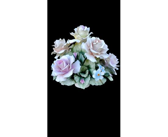 Floral arrangement with Bisquit porcelain basket. Capodimonte.