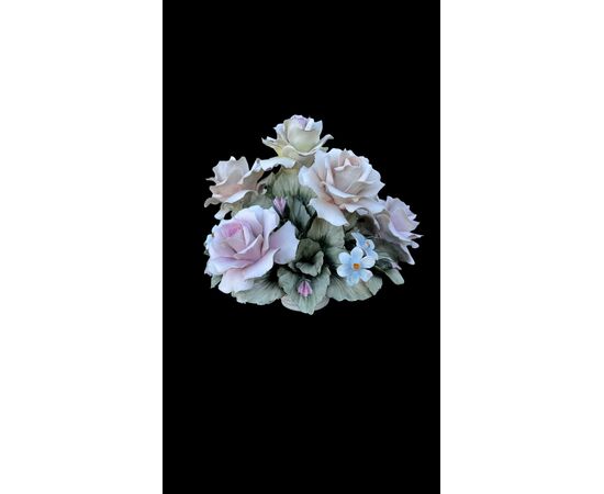 Floral arrangement with Bisquit porcelain basket. Capodimonte.