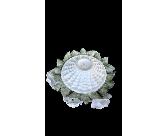 Floral arrangement with Bisquit porcelain basket. Capodimonte.