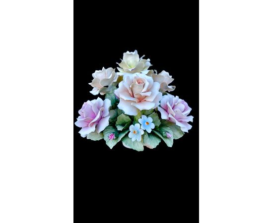 Floral arrangement with Bisquit porcelain basket. Capodimonte.