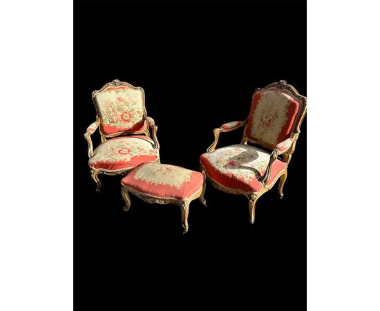 Coppia di poltrone con pouf