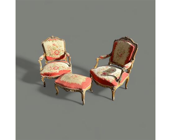 Coppia di poltrone con pouf