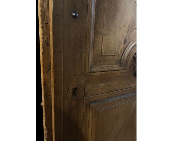PTCR434 - Rustic walnut entrance door, diamond-carved panels, 19th century, clear opening cm W 78 x H 173