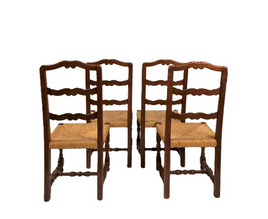 Group of four walnut chairs, 20th century