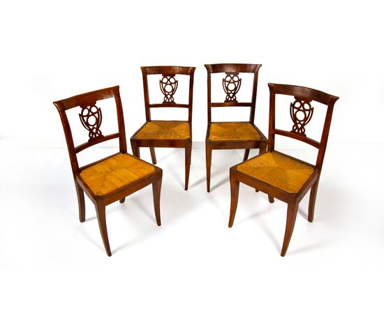 Four walnut chairs, Veneto, first half of the 19th century