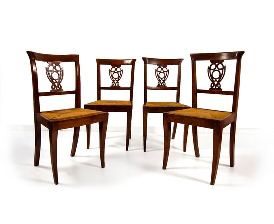 Four walnut chairs, Veneto, first half of the 19th century