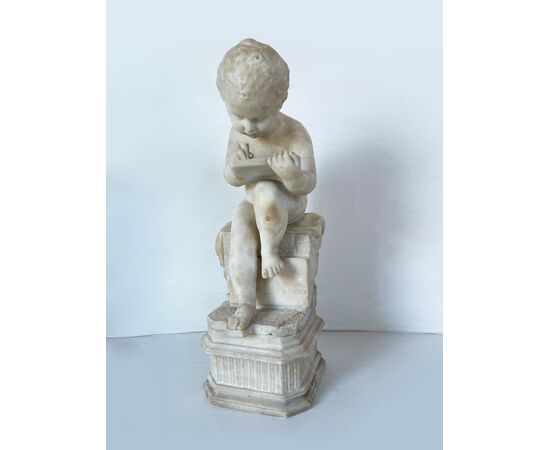 "Putto writing" - alabaster sculpture