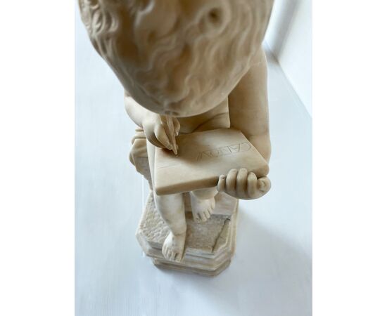 "Putto writing" - alabaster sculpture