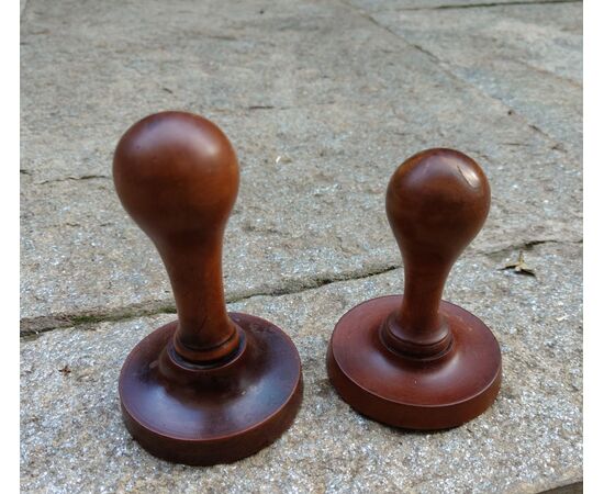 Two round butter stamps with handle, 19th century