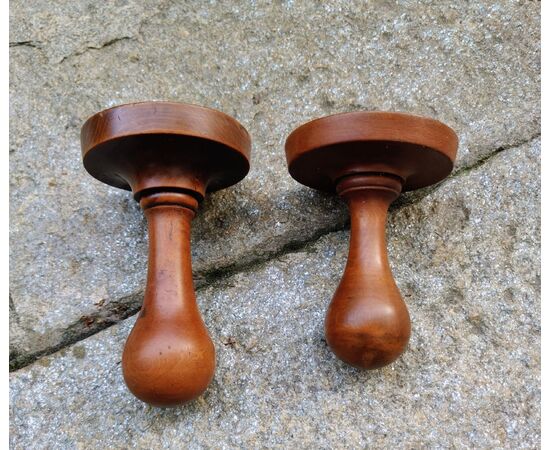 Two round butter stamps with handle, 19th century