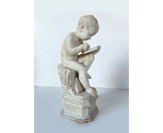 "Putto writing" - alabaster sculpture