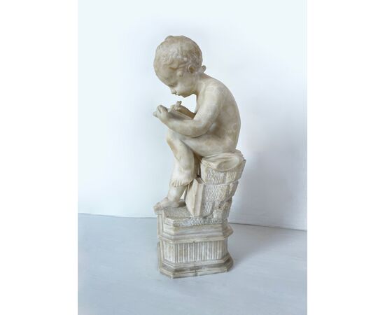"Putto writing" - alabaster sculpture