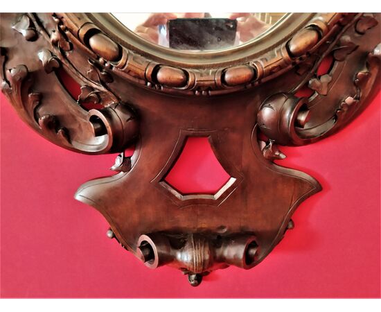 Mirror in carved wood