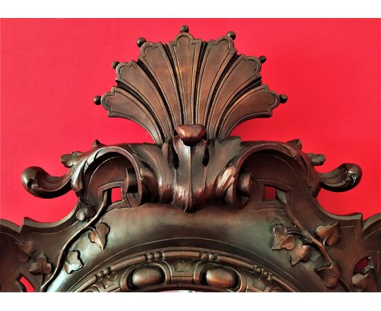 Mirror in carved wood