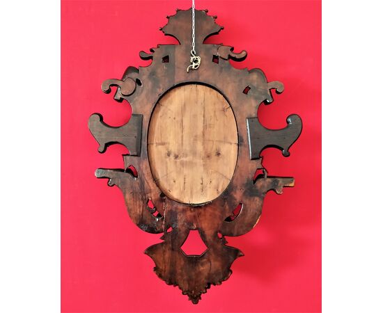 Mirror in carved wood