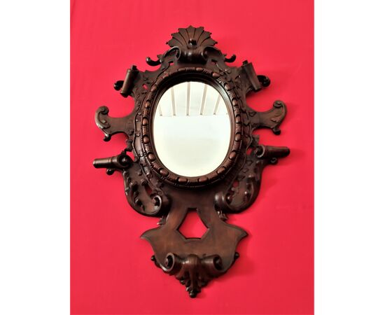 Mirror in carved wood