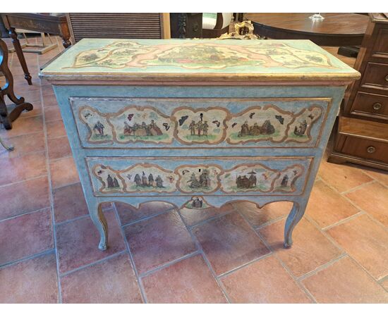 Chest of drawers painted with papier-mâché applications