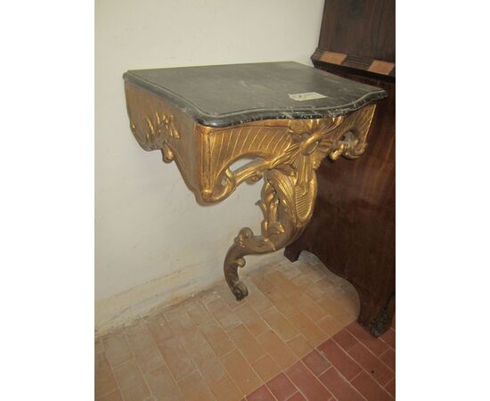 Small console in gilded wood