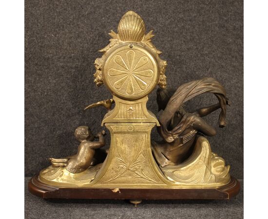 French clock in bronze and gilded antimony