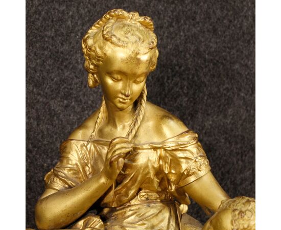 French clock in golden antimony