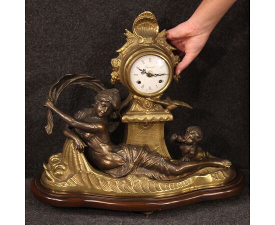 French clock in bronze and gilded antimony