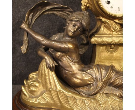 French clock in bronze and gilded antimony