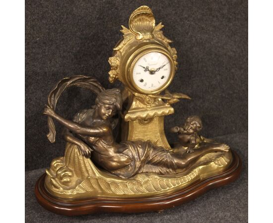 French clock in bronze and gilded antimony