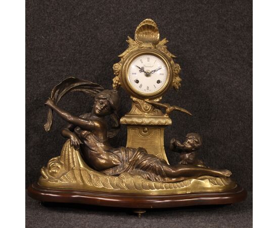 French clock in bronze and gilded antimony