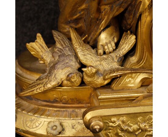 French clock in golden antimony