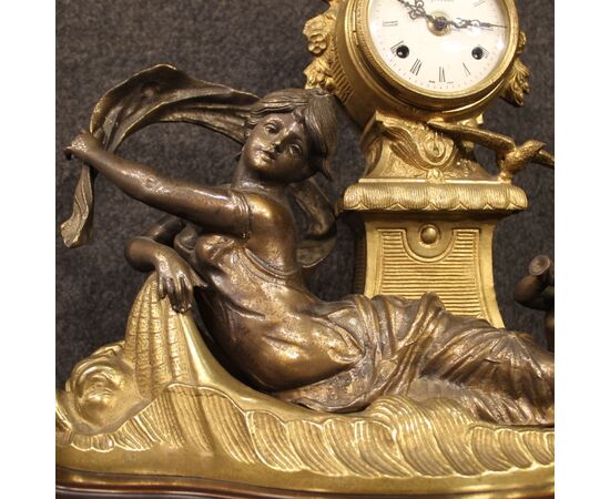 French clock in bronze and gilded antimony